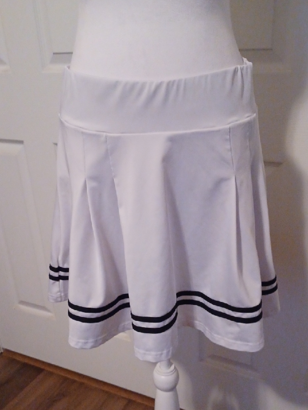 × White Pleated Tennis Skort with Black Stripe Detail
